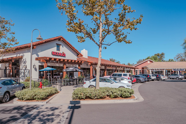 bridgepark Exterior view of a casual dining restaurant with a red sign reading 'Selmas'